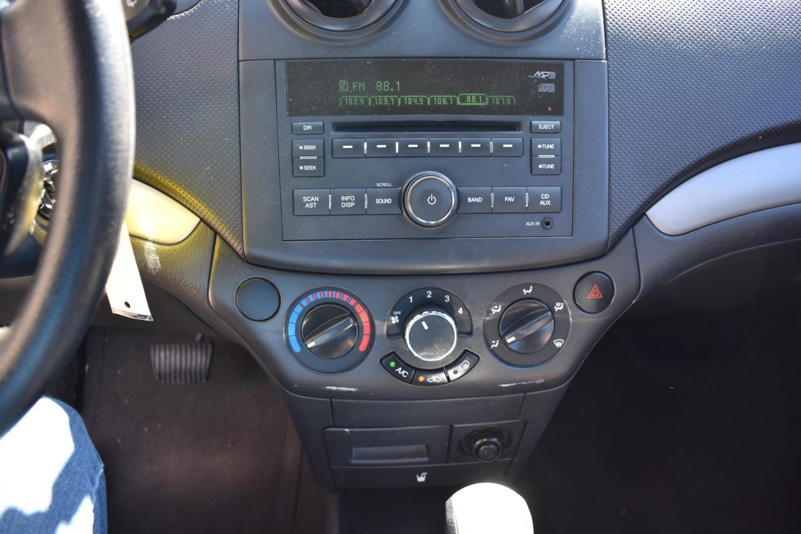 2009 Blue /Gray Chevrolet Aveo5 (KL1TD66E49B) with an 4.1.6L engine, 4 SPEED AUTOMATIC transmission, located at 5925 E. BELKNAP ST., HALTOM CITY, TX, 76117, (817) 834-4222, 32.803799, -97.259003 - Buying a 2009 Chevrolet Aveo5 LS can offer several benefits: Affordability: As a compact car from over a decade ago, the Aveo5 LS is likely to be quite affordable, making it an attractive option for budget-conscious buyers. Fuel Efficiency: The Aveo5 LS is known for its good fuel economy, which - Photo#12